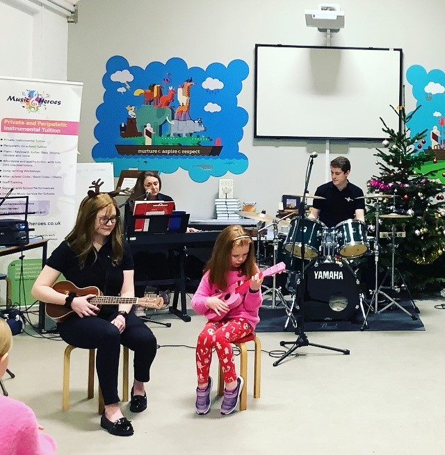 Children playing instruments at Christmas Concert