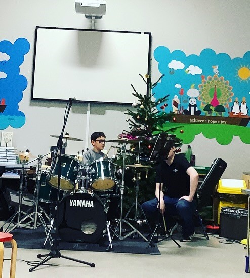 Children playing instruments at Christmas Concert