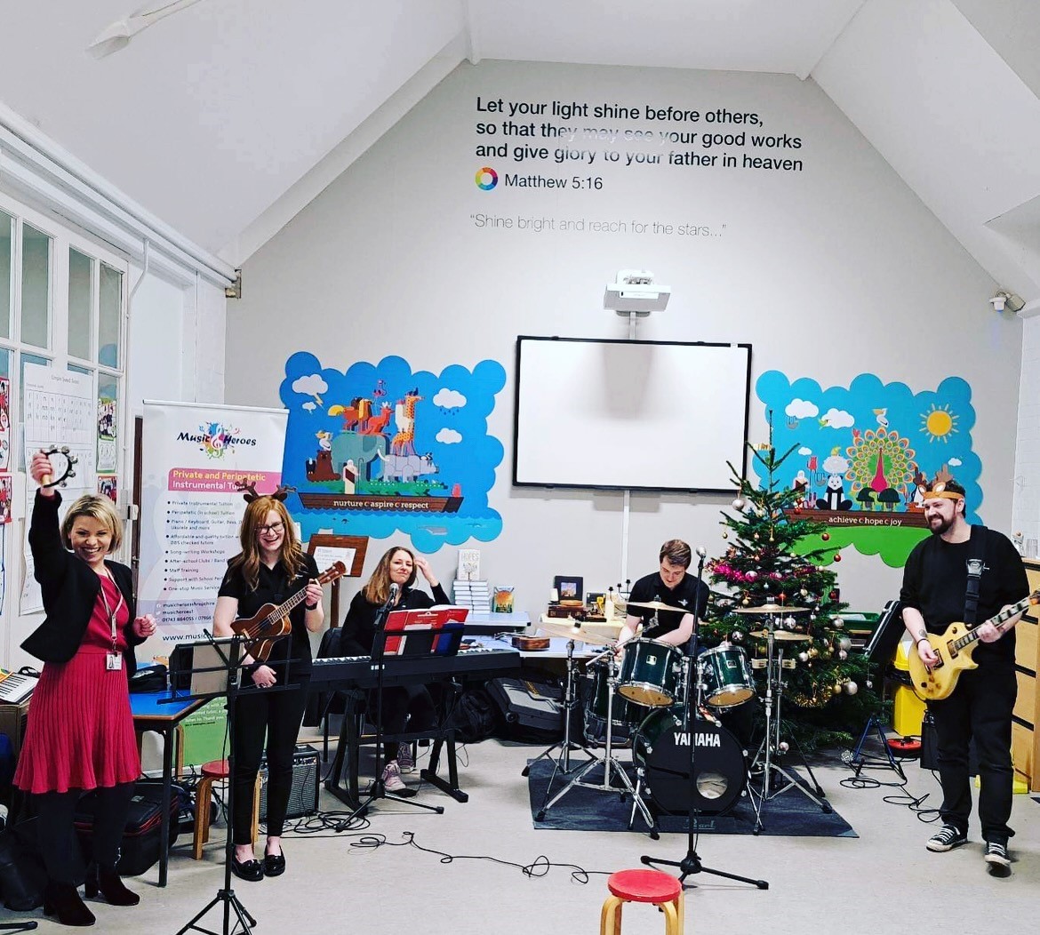 Children playing instruments at Christmas Concert